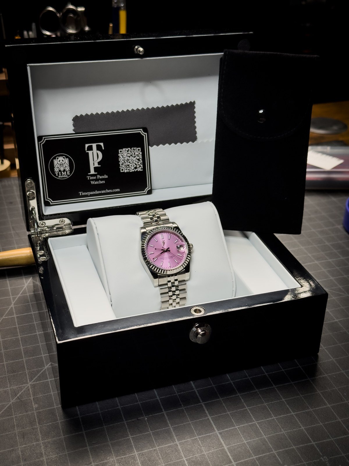 Pink-dial watch with a steel bracelet
